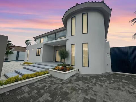 Nestled near Aruba’s iconic coastline, this 9-bedroom villa offers a perfect blend of luxury, comfort, and convenience.