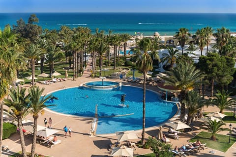 Indoor pool, outdoor pool, pool umbrellas, sun loungers