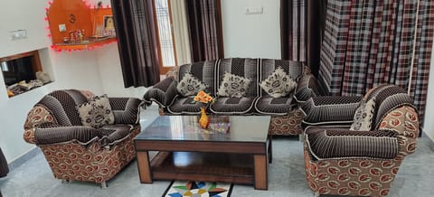 Standard Room, Balcony, City View | Living area | 32-inch LED TV with satellite channels