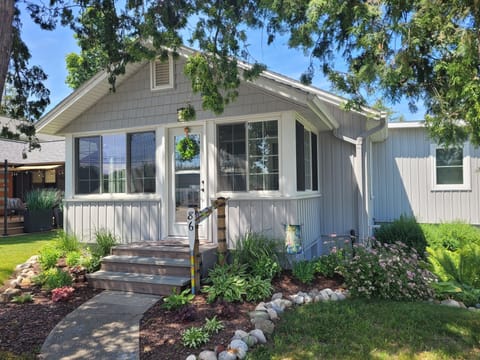 OVERVIEW:  The front of the home in summer.