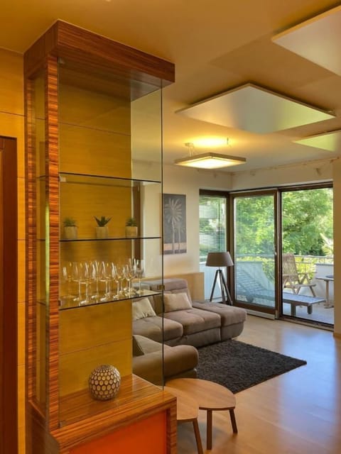 Comfort Apartment, 1 Bedroom, Balcony, Garden View | Living area | Flat-screen TV