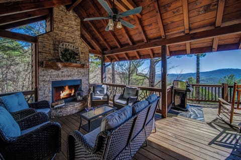 Enjoy your cocktails with friends, no matter what the weather, on your covered Party Porch with Fireplace