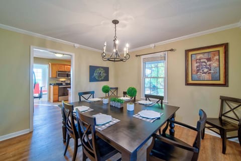 Gather for elegant meals together at the dining table, with seating for 6