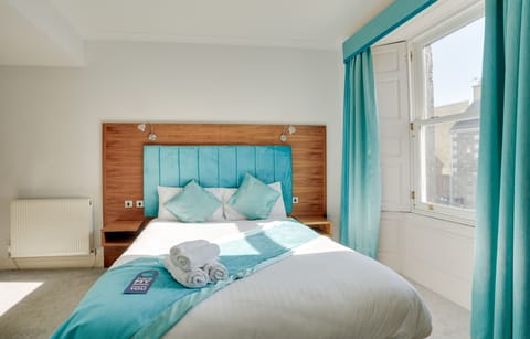 Family Quadruple Room, Multiple Beds, Ensuite | Laptop workspace, iron/ironing board, free WiFi, bed sheets