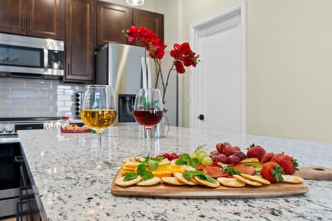 Enjoy lively conversations around the kitchen island, where great food and good company come together