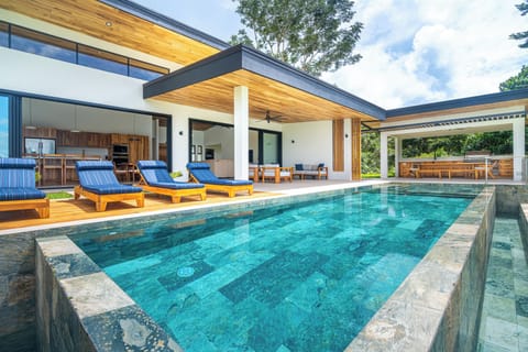 A vast and elegant pool area, creating the perfect setting for a luxurious experience.
