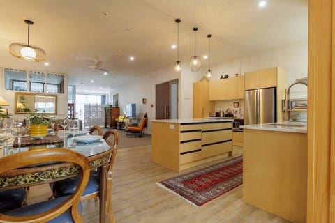 The open-plan kitchen and living room is super spacious and perfectly suited to cook up a storm if you prefer to eat in.