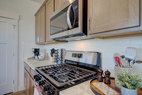 Kitchen: Contemporary kitchen equipped with state-of-the-art stainless steel appliances.
