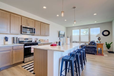 Kitchen: Stunning kitchen with a large island, perfect for cooking and casual dining.