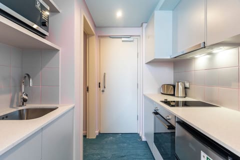 Mini-fridge, microwave, oven, stovetop