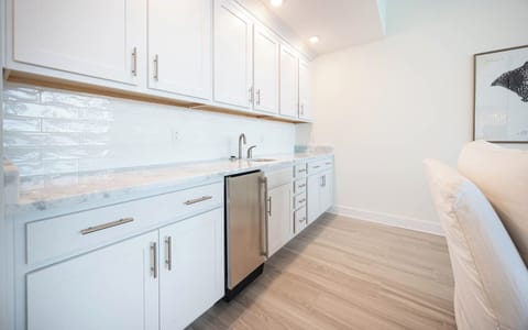 Grab a chilled drink from the fridge or create your favorite cocktail at the wet bar