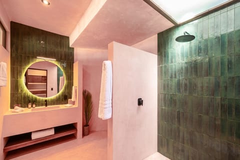 Suite, 2 Queen Beds, Ocean View | Bathroom | Shower, rainfall showerhead, hair dryer, towels