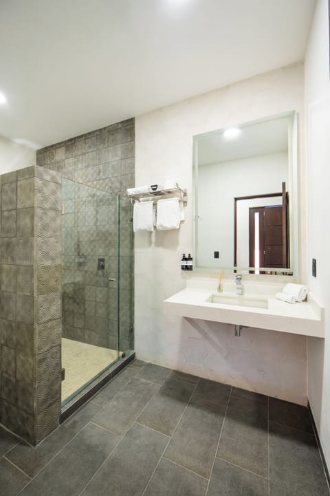 Superior Room, 1 King Bed | Bathroom | Shower, rainfall showerhead, hair dryer, heated floors