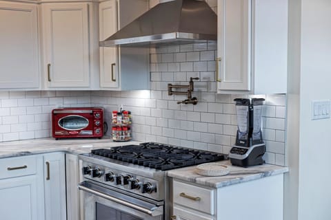 Gas range and modern finishes perfect for cooking large family meals.