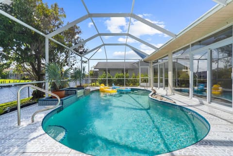 Private heated pool with peaceful Gulf-access canal views