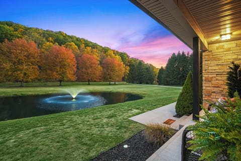 Relax by the pond and enjoy the calming fountain (seasonal) amidst a stunning natural backdrop.