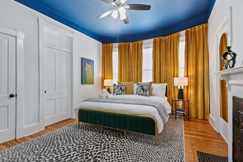 Nestled at the heart of The Manor, the Hearth Room offers a cozy retreat with a king bed, extra pillows, a soft blanket, and a smart TV—everything you need to unwind in comfort.