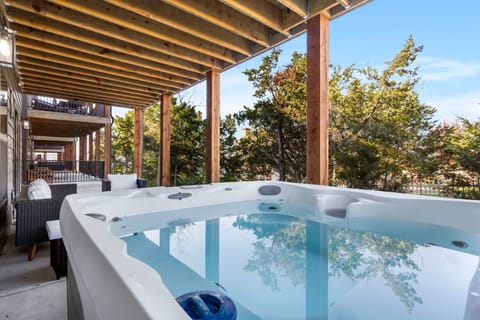 Downstairs Patio with Seating and a Hot Tub!