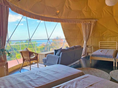 ・[Dome Tent C] A dome tent for four people equipped with four single beds.