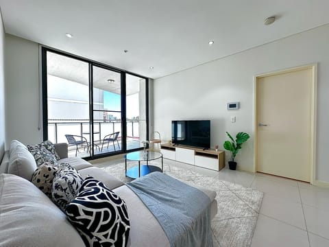 Comfort Apartment, 2 Bedrooms, City View | Living area | Flat-screen TV