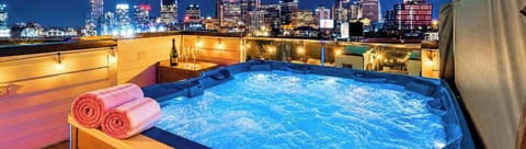 Soak under the stars on the rooftop hot tub while Nashville's skyline glows around you, string lights overhead and the whole city at your feet