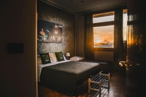 Deluxe Triple Room, City View | Desk, blackout drapes, iron/ironing board, free WiFi