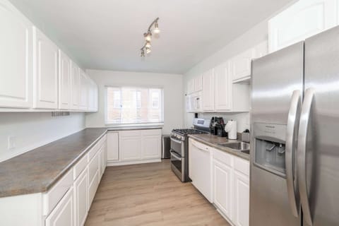 Suite 1’s airy kitchen offers ample space & all the comforts of home