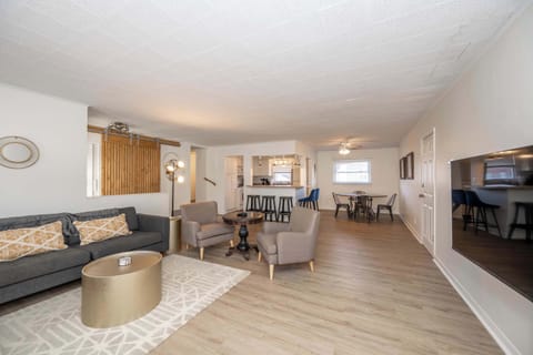 Unwind in the stylish living room & stream your favorites on the smart TV