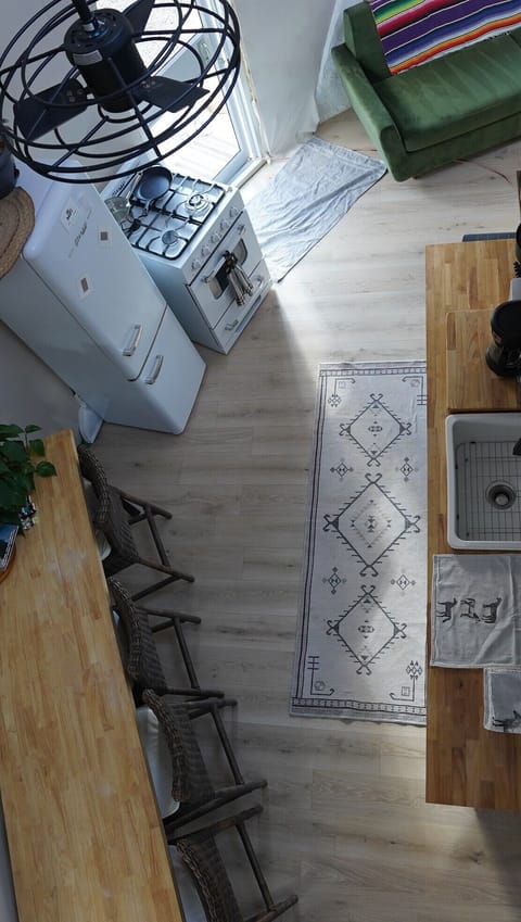 The kitchen pictured from the sleeping loft