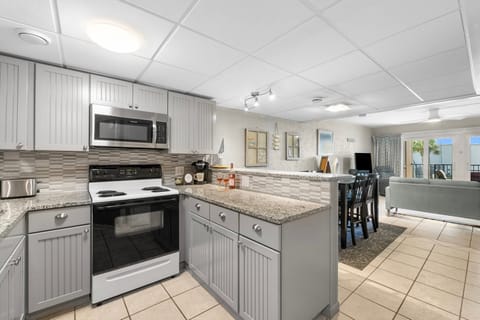 Fully equipped kitchen, cozy dining area, and open layout designed for time together.