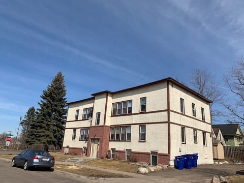 Front of the building and some off street parking.
