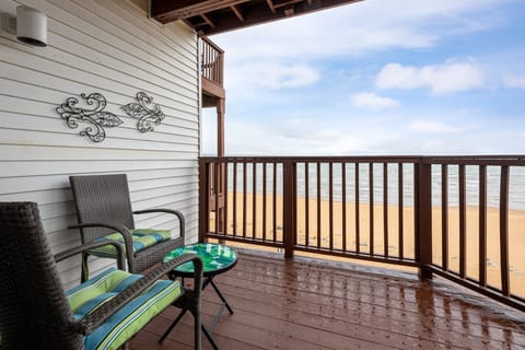 Private balcony w/ seating, perfect for soaking in fresh air & coastal views.