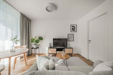 Welcome to the living room, the heart of your home, where Arbio Designers have curated a space for relaxation and togetherness.