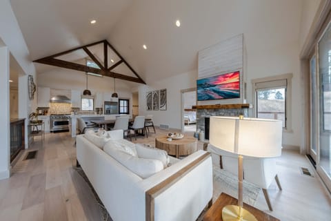 Enjoy the bright and open-concept living space with vaulted