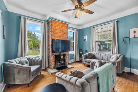 Living room with seating and 55 inch smart TV