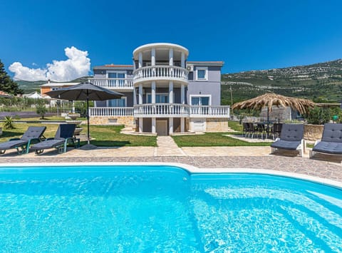 Villa (Eight Bedroom Villa with Pool and Gym) | Outdoor pool | Seasonal outdoor pool, pool umbrellas, sun loungers