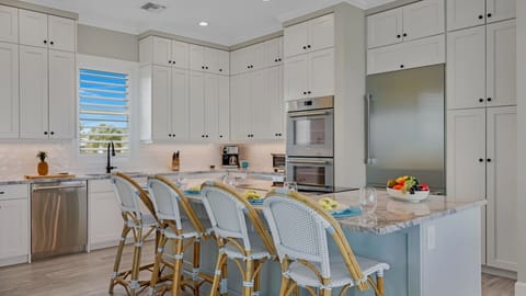 The sleek, modern kitchen has everything you need to prepare a gourmet meal for your crew...