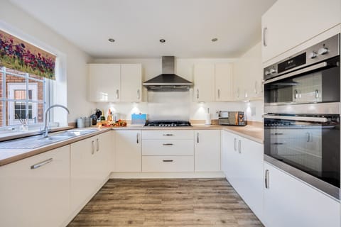 A fully equipped kitchen with everything you need to prepare a home cooked meal