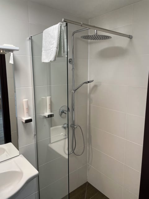 Shower, towels, soap, shampoo