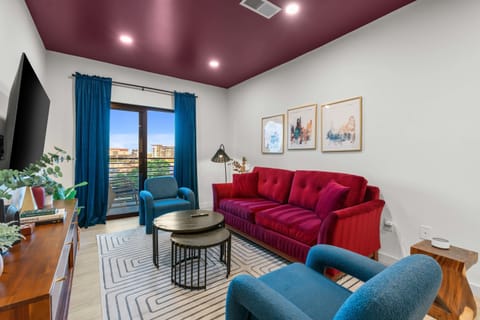 Living Room: complete with a sleeper sofa and smart TV.