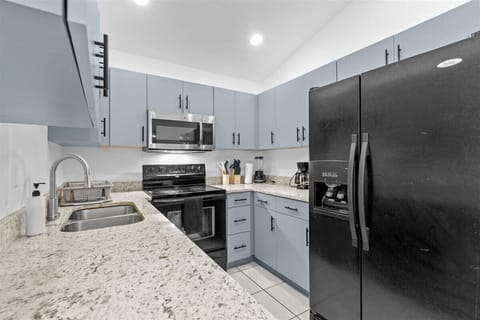 4. Fully stocked kitchen with pots and pans for 8 people. All cooking essential. Fridge dispenses fi