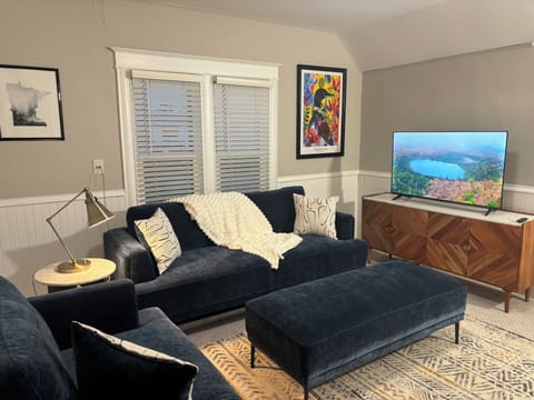 Living Room complete with 50" smart TV, blankets and a few fun games!