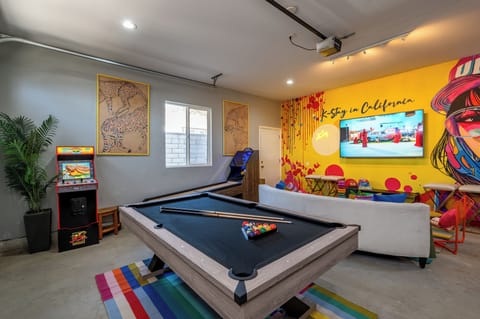 FUN! Arcade, Speed ball, Pool table, 75 inch Smart TV, Board games and more!