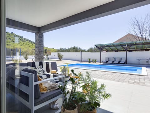 Swimming Pool, Outdoor Furniture, Furniture, Flooring, Architecture, Shade, Home, Floor, Resort, Composite Material