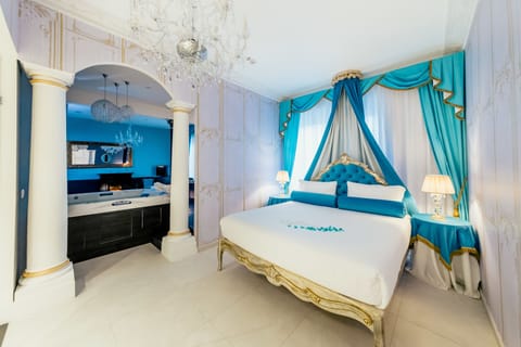 Premium bedding, down comforters, pillowtop beds, minibar