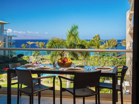 Enjoy your meals with breathtaking views of the Pacific Ocean from this elegant outdoor dining space. Perfect for relaxing and soaking in the coastal beauty.