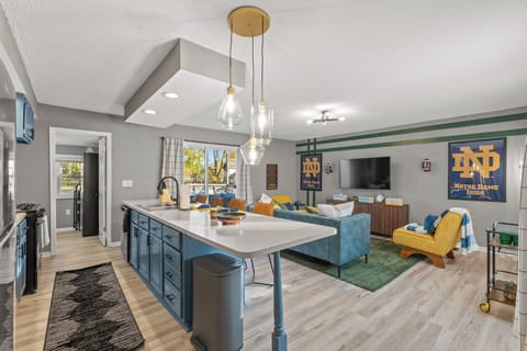 Open floor plan concept featuring the kitchen and living room