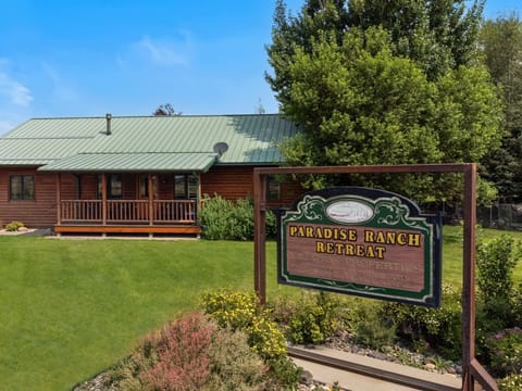 Front view of Moose Horn cabin, lush yard for activities