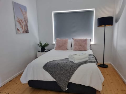 Bedroom 2 with flat screen tv Netflix and split system heating and cooling