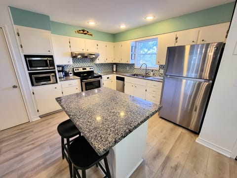 Fully stocked kitchen will satisfy all your cooking needs.